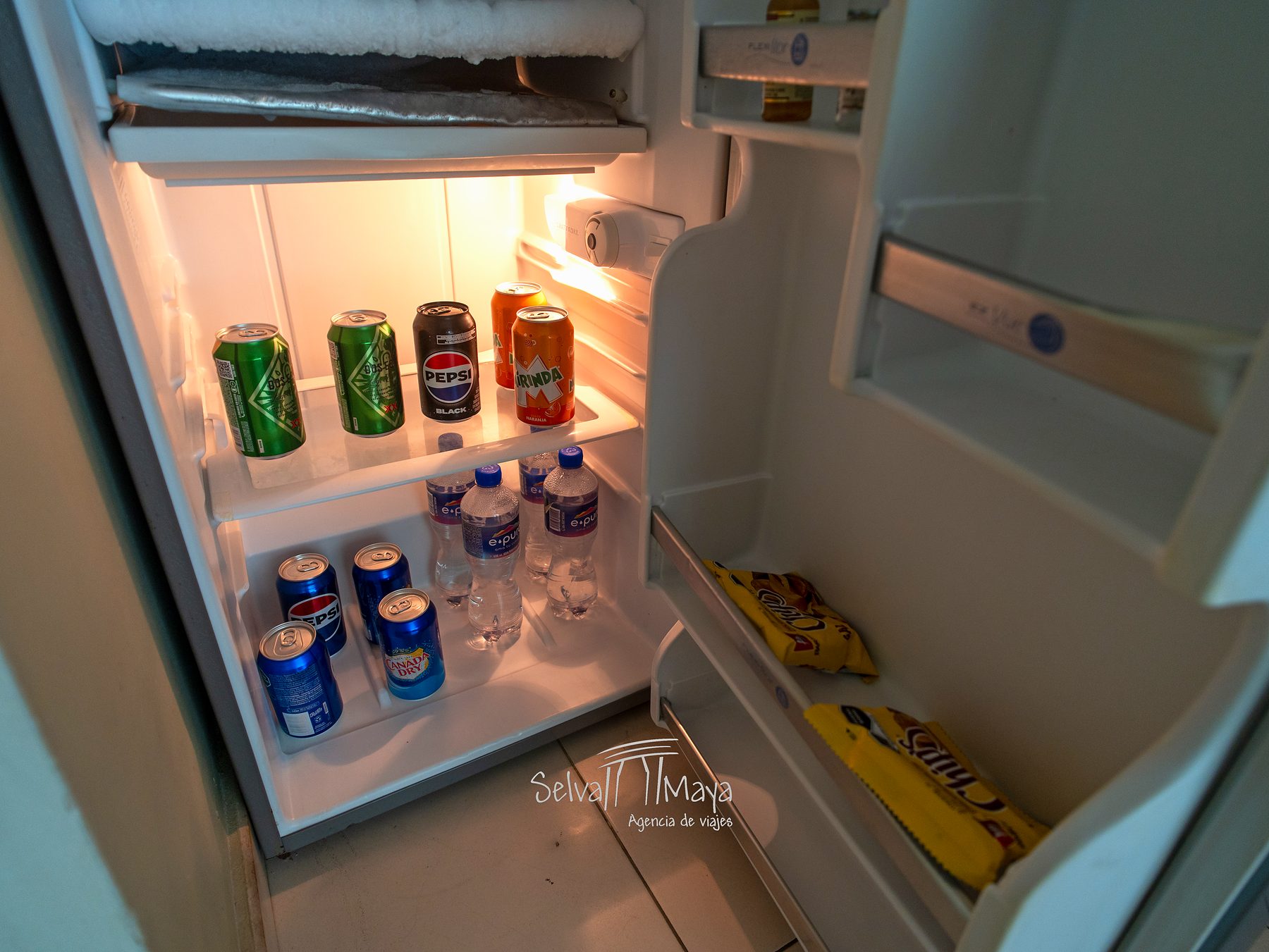 Frigobar de la suite en Bahía Príncipe Escape Sian Ka'an
